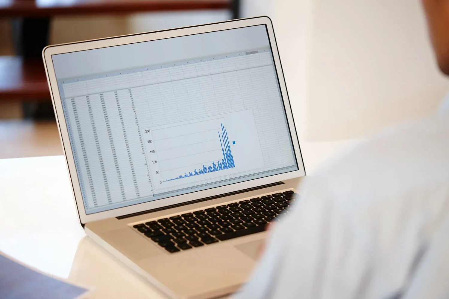 A laptop showing a recovery performance dashboard.